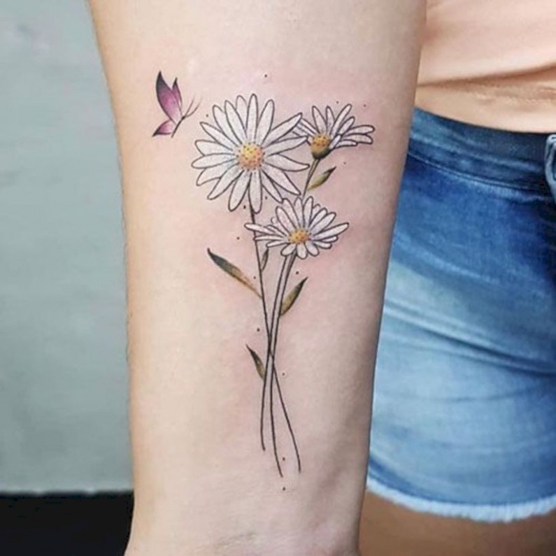 Colorful blowing daisy flower tattoo for you - Body Tattoo Art