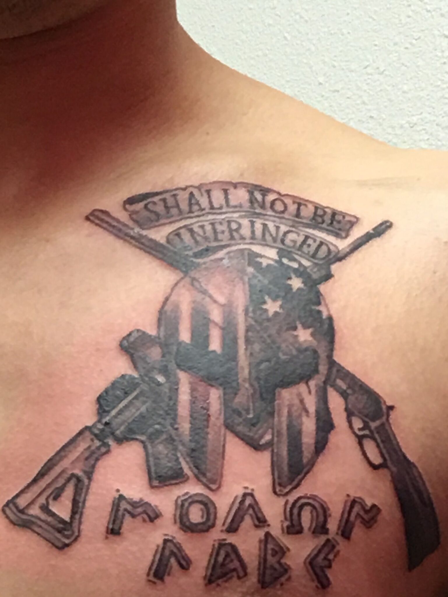 Eagle and flag Molon labe tattoo.