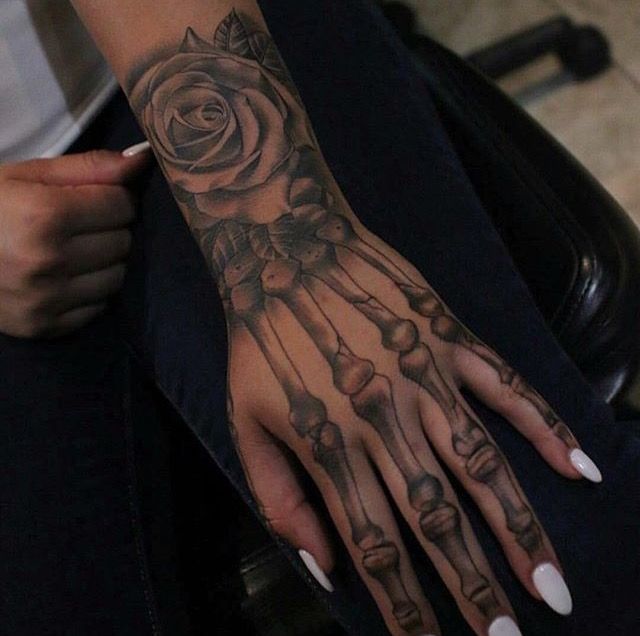 60+ Skeleton Hand Tattoo Ideas (and The Symbolism behind Them) - Saved  Tattoo