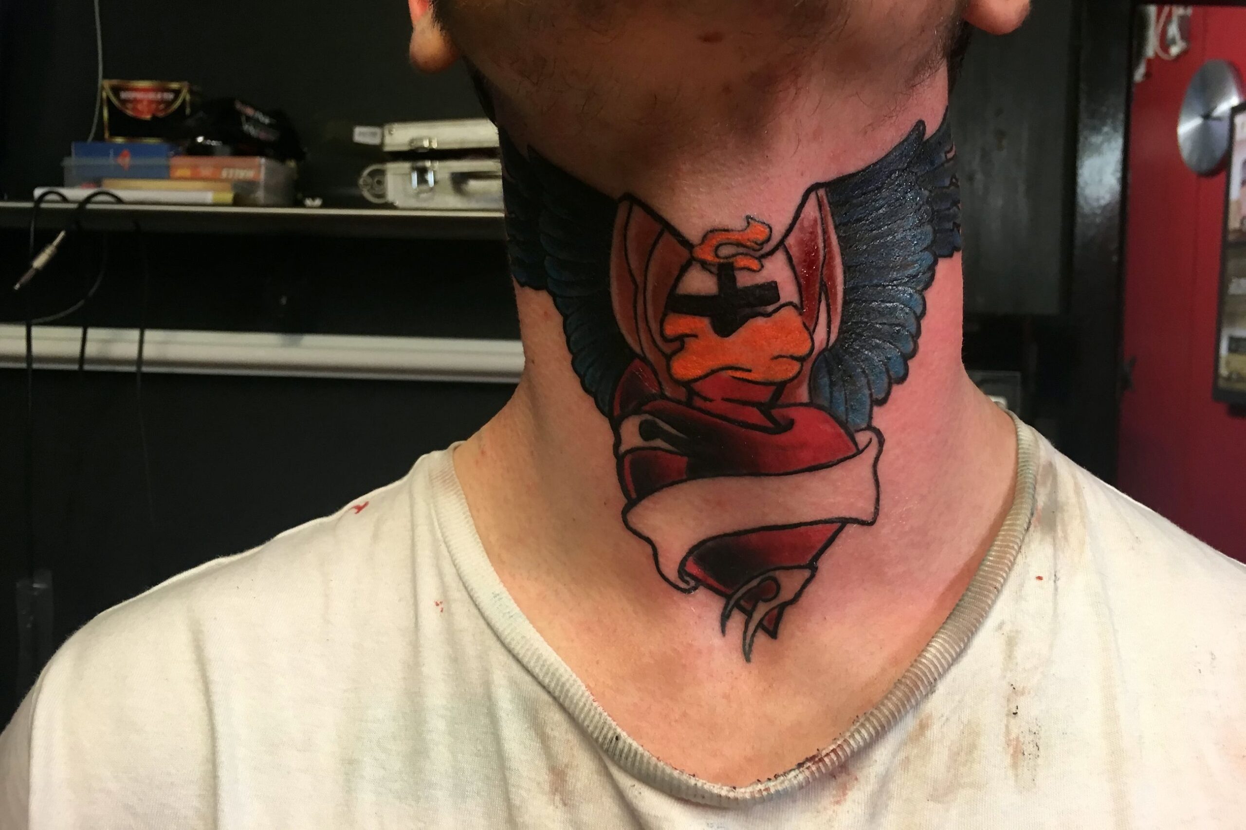 Find the coolest neck and throat tattoos for men and women. 